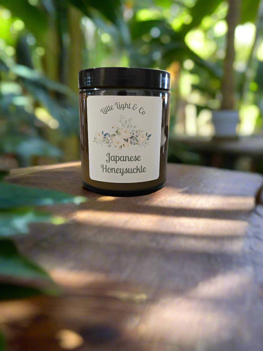 Japanese Honeysuckle scented candle in a reuseable amber jar