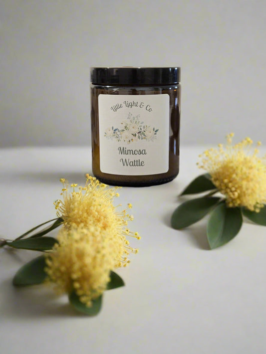 Mimosa wattle scented candle in a reuseable amber jar 