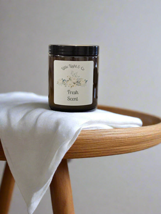 Fresh Scent candle in reuseable amber jar 