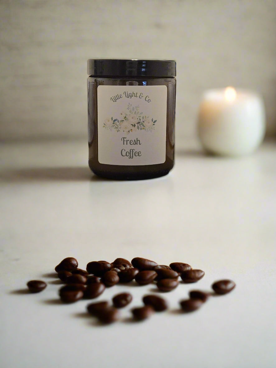 Little Light & Co Fresh Coffee scented candle in a reuseable amber jar 