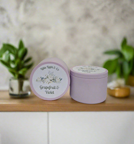 Purple candle tin with 'Grapefruit & Violet' fragrance little light & co