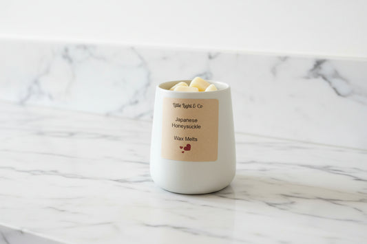 Large Jar of wax melts on a marble surface little light & co